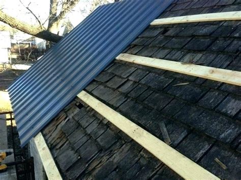 can you put sheet metal over shingles|metal roofing over existing shingles.